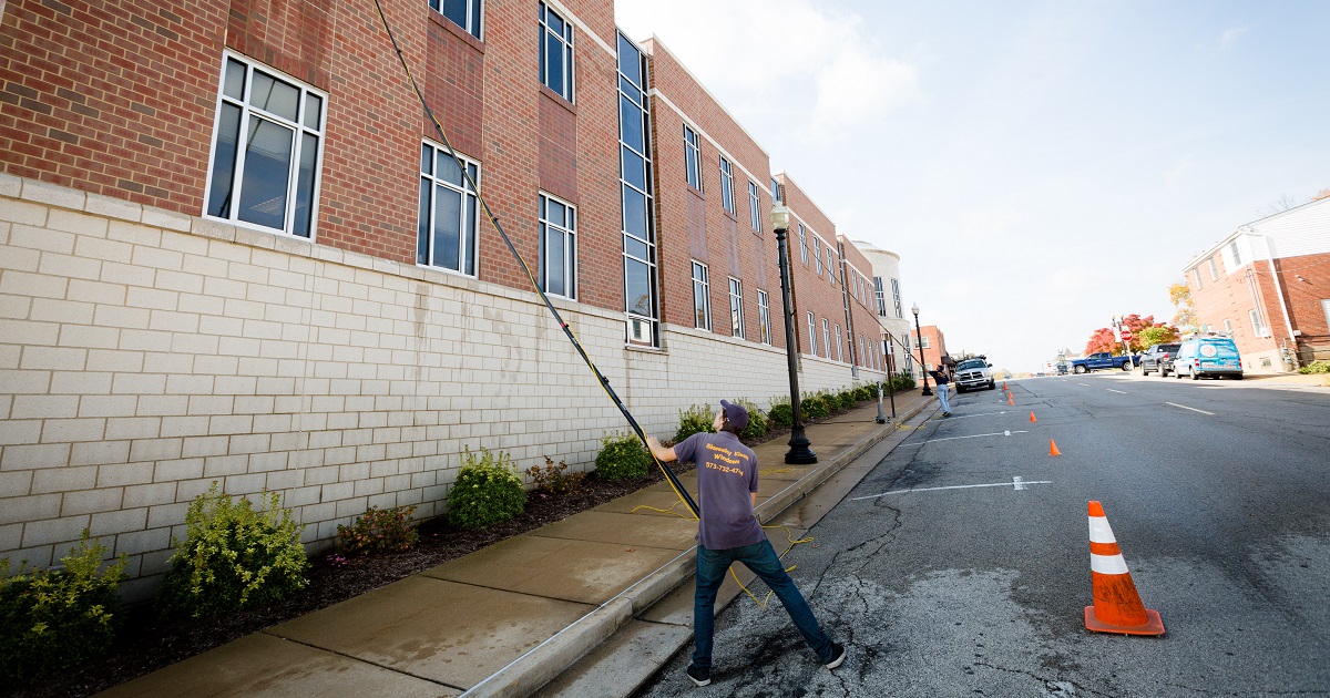 Window washer using water-fed pole